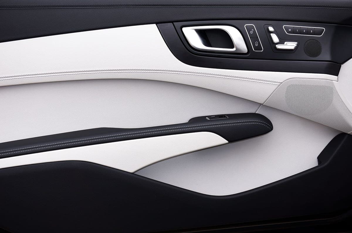 The interior door panel and armrest of a car