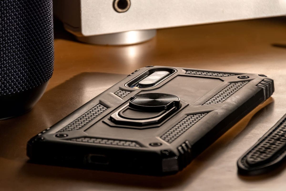 A smartphone in a rugged protective case