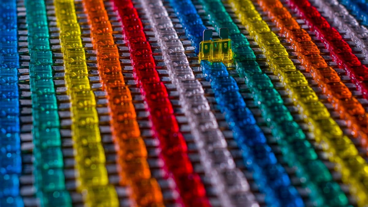 Rows of colored automotive blade fuses