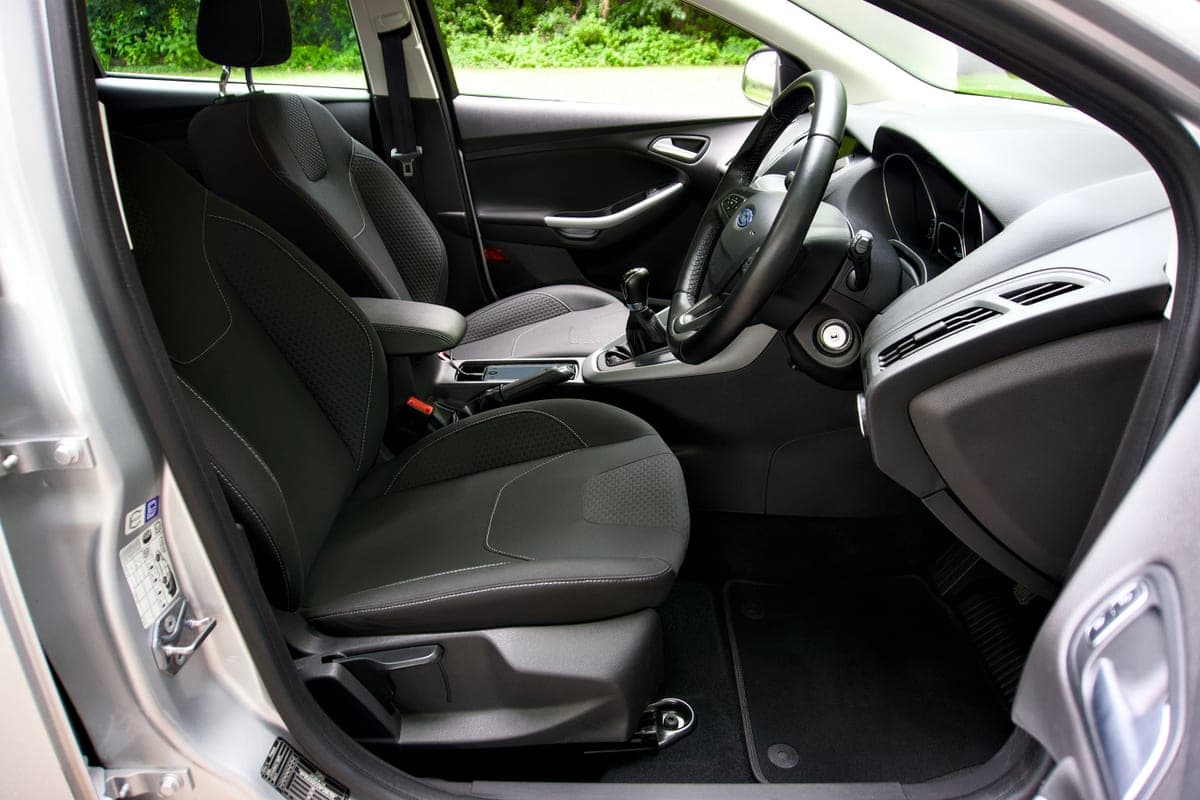 The leather front seats of an SUV interior