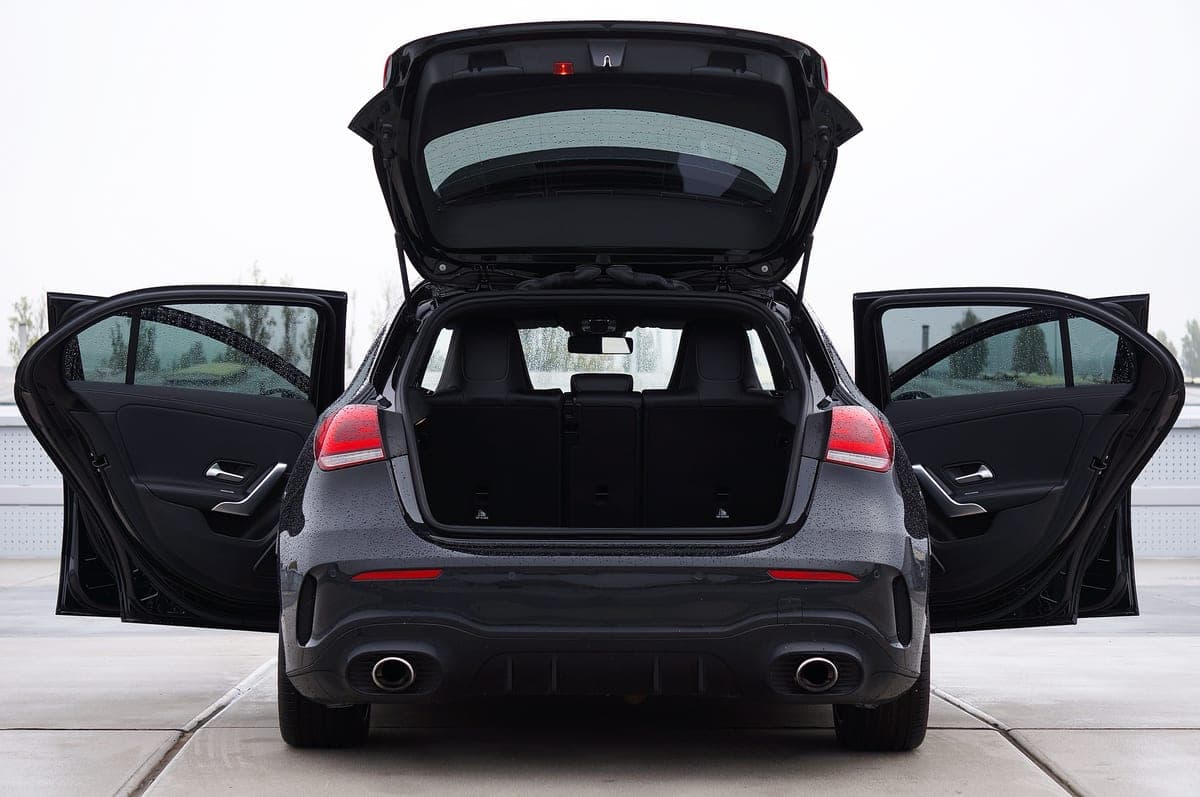 An electric car with the rear cargo hatch open