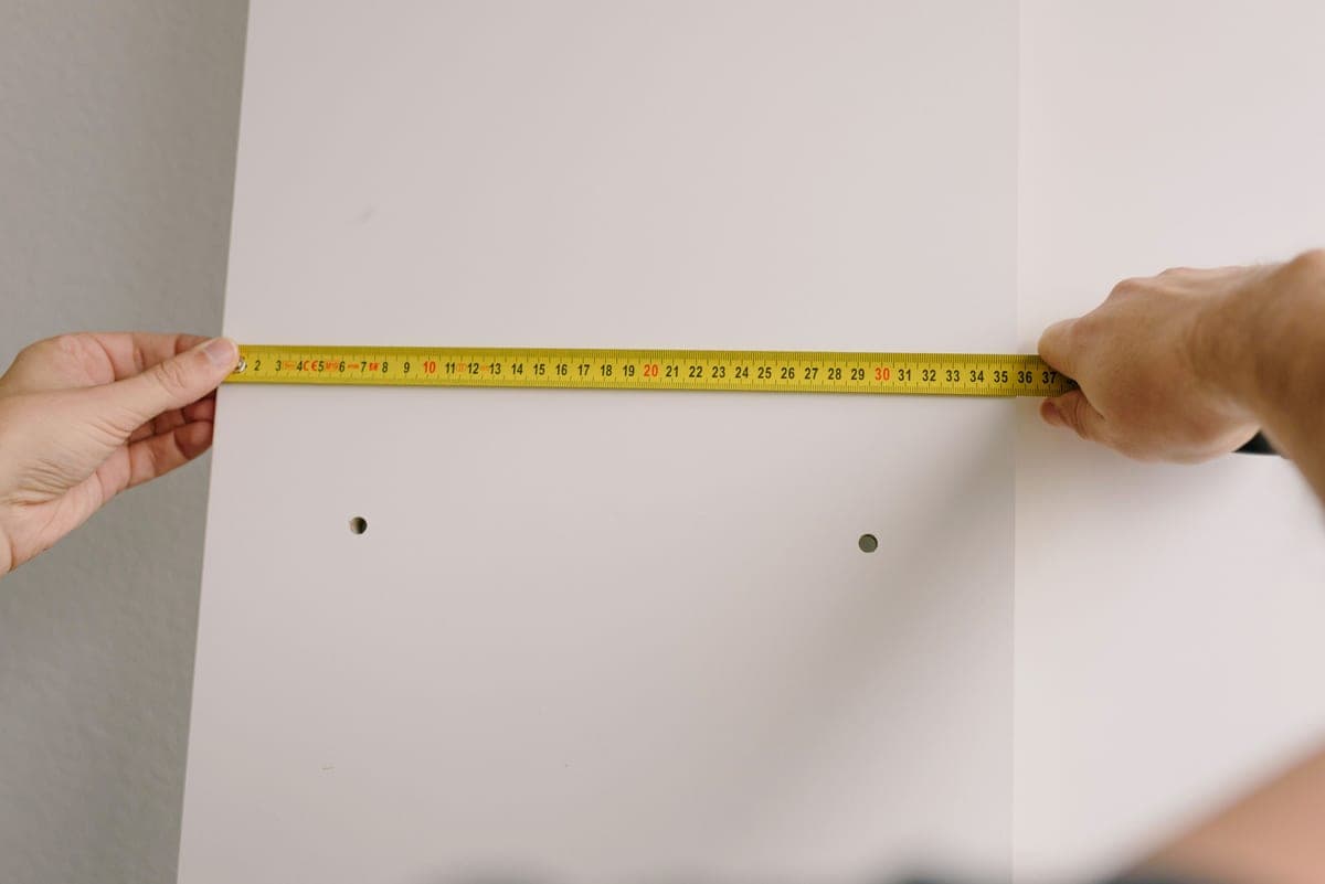 A tape measure across a car cargo space